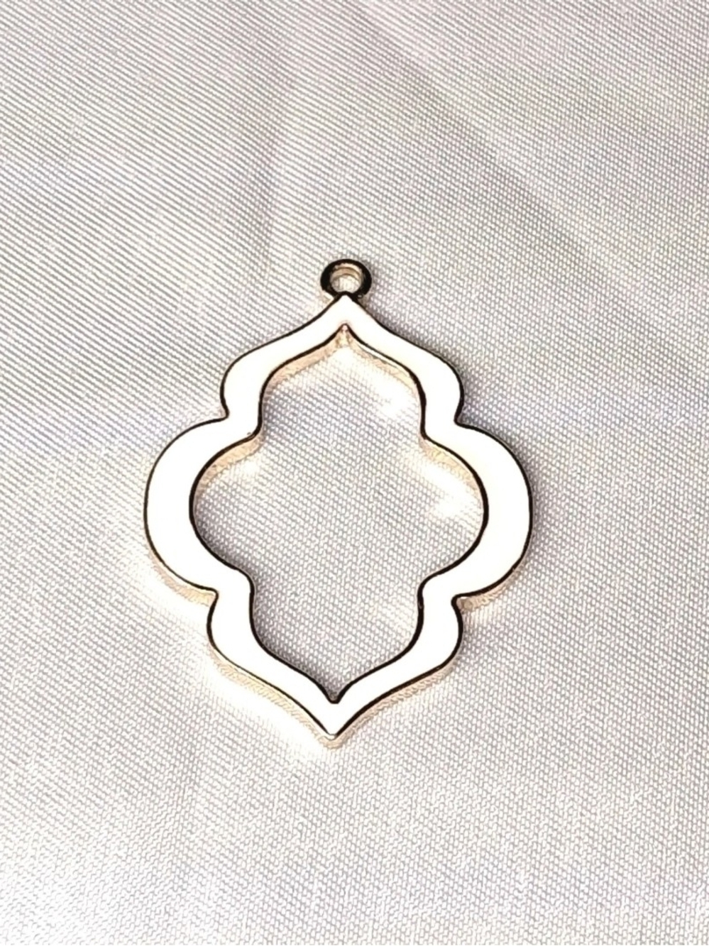 Moroccan quatrefoil gold tone steel  openwork white charm design pendant